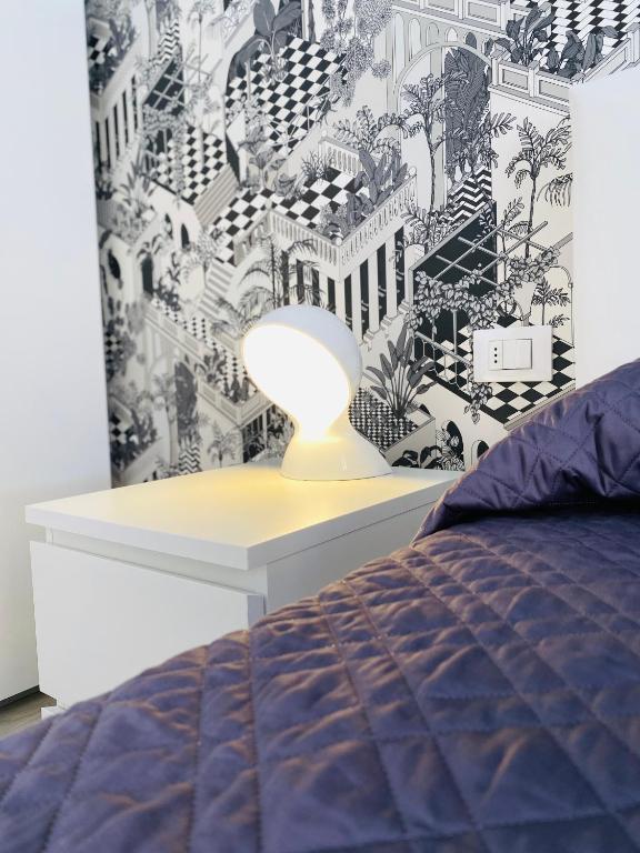 Postel nebo postele na pokoji v ubytování InLuce Apartment Top Class