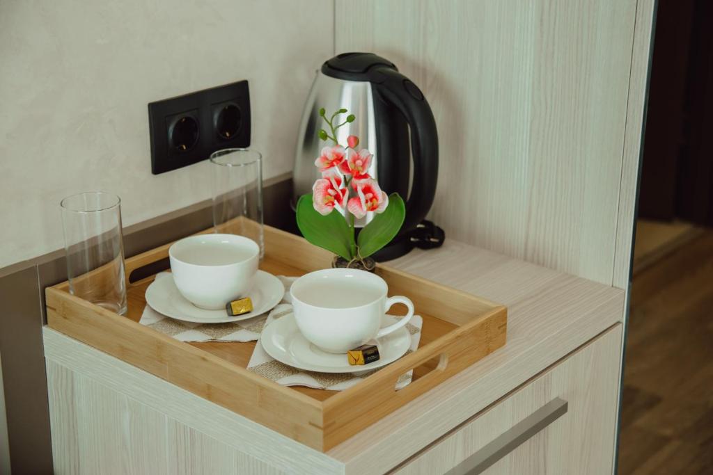Příslušenství pro přípravu čaje a kávy v ubytování Hotel Kanzler
