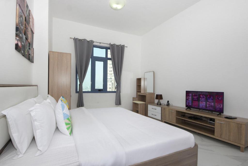 Signature Holiday Homes - Furnished Studio in Palace Tower 2, Silicon Oasis, Dubai – Updated 2022 Prices