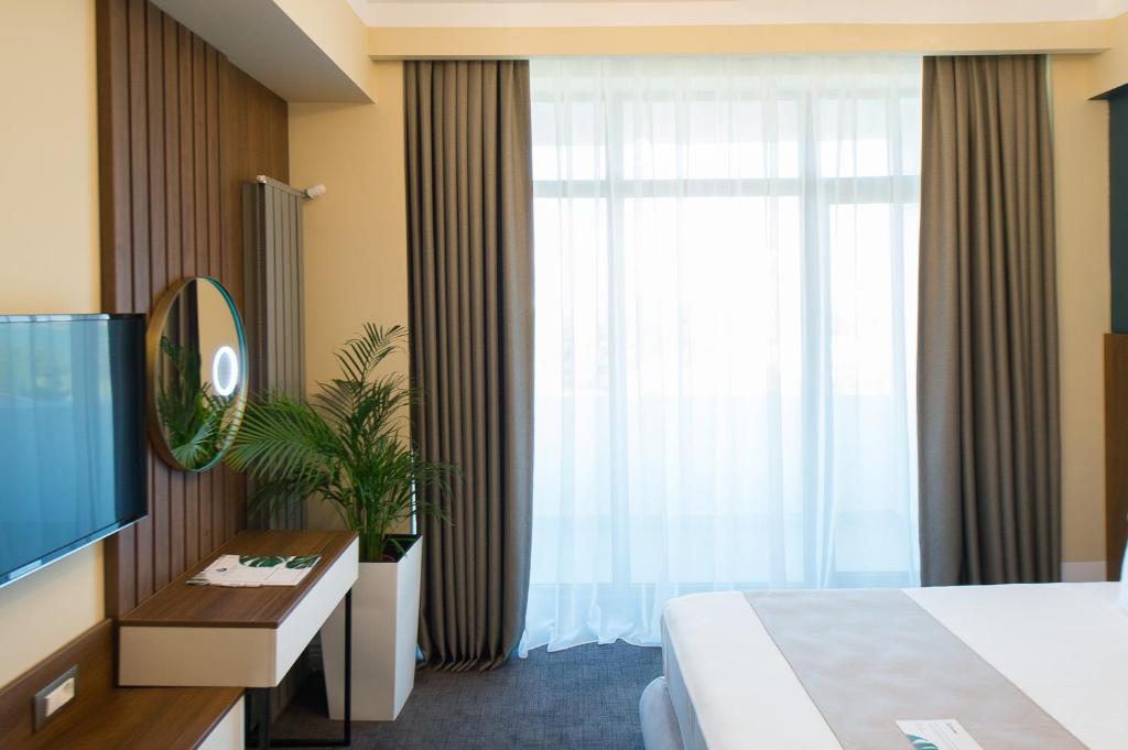 Postel nebo postele na pokoji v ubytování Hotel Oxford