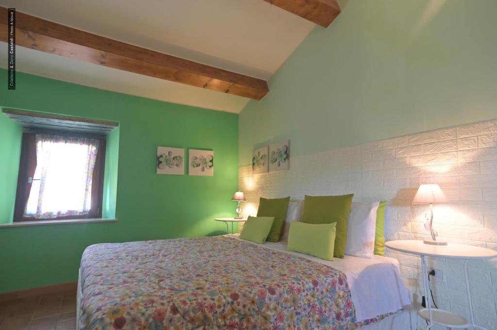 Postel nebo postele na pokoji v ubytování B&B Dimora Paolina