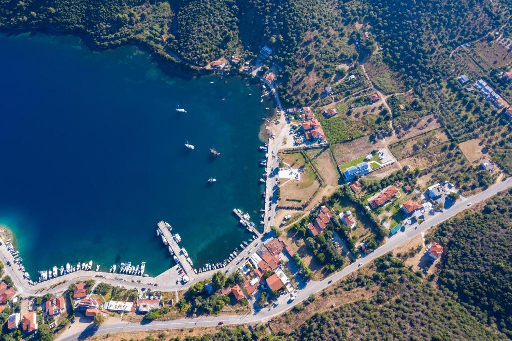an aerial view of a harbor with a marina at Notia Luxury Living in Porto Koufo
