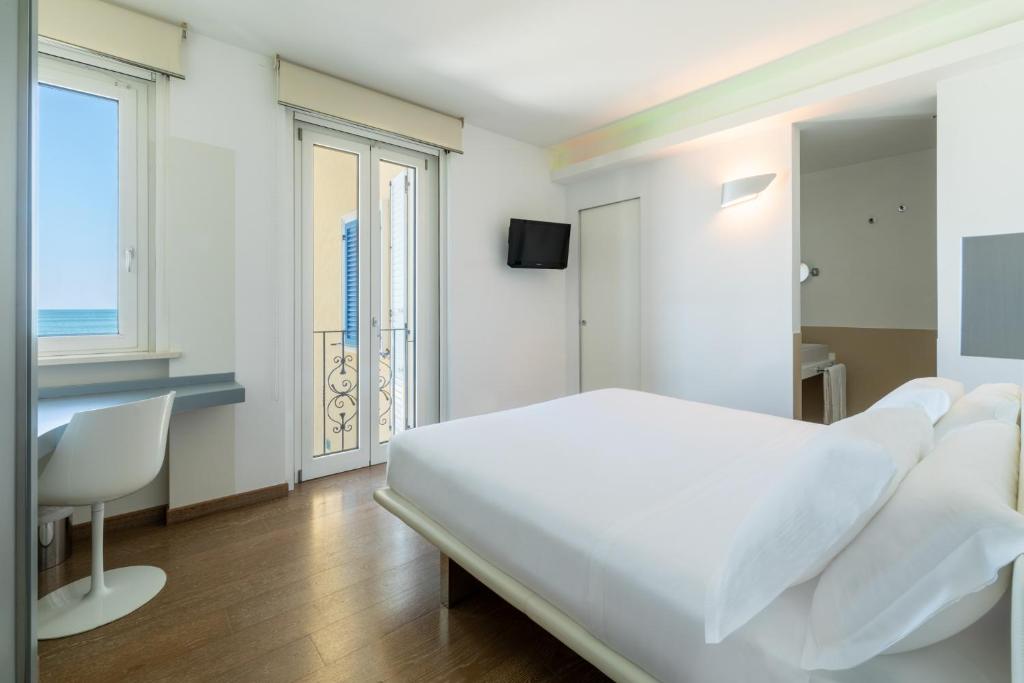 Postel nebo postele na pokoji v ubytování Life Hotel Seaview & Spa