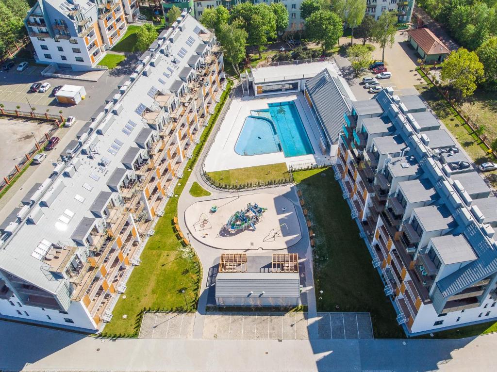 an aerial view of a marina with a pool at APT Nadmorskie - Feniks in Kołobrzeg
