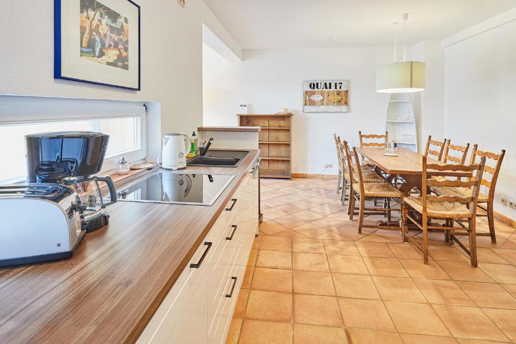 Kuchyň nebo kuchyňský kout v ubytování Gutshotel Baron Knyphausen
