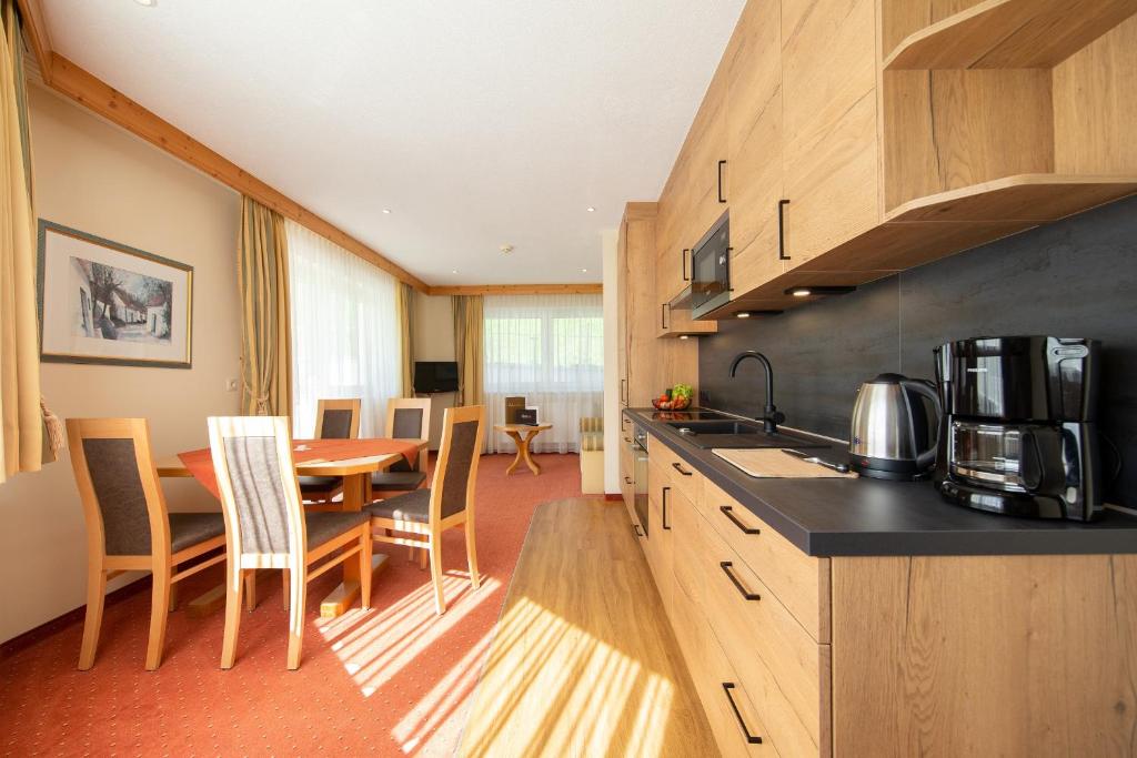 Kuchyň nebo kuchyňský kout v ubytování Hotel Appart Peter