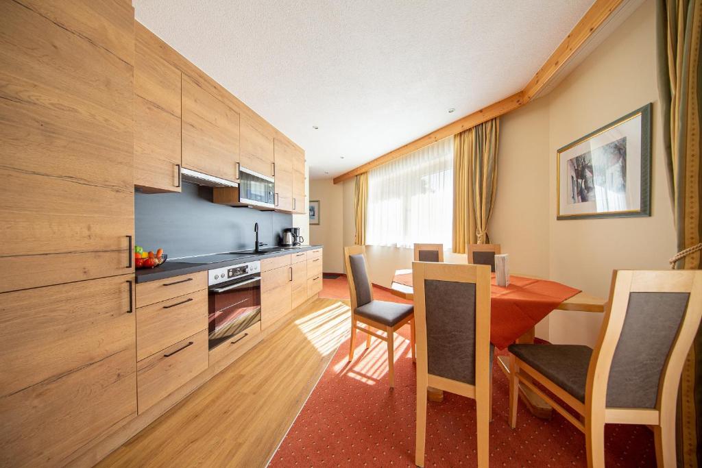 Kuchyň nebo kuchyňský kout v ubytování Hotel Appart Peter