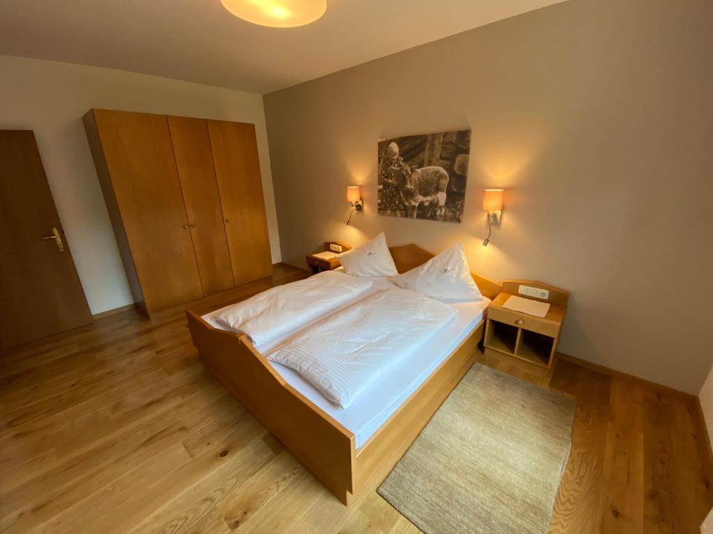Postel nebo postele na pokoji v ubytování Appartements Oswaldeck