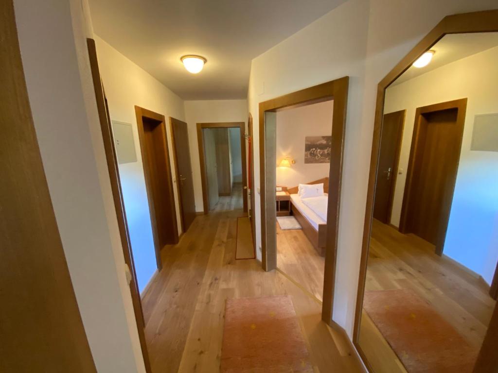 Postel nebo postele na pokoji v ubytování Appartements Oswaldeck