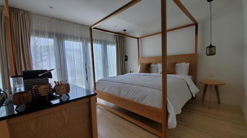 Postel nebo postele na pokoji v ubytování Hotel Secreto