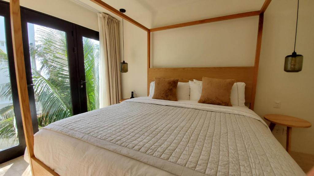 Postel nebo postele na pokoji v ubytování Hotel Secreto