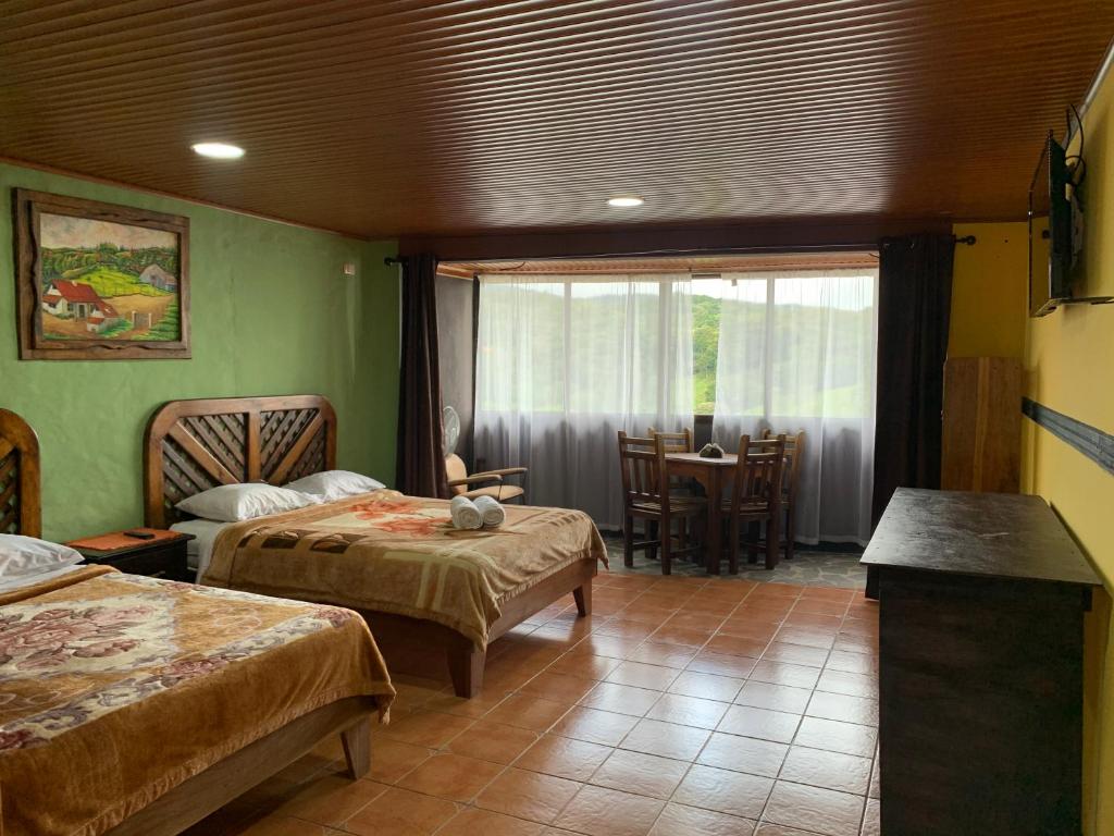 Postel nebo postele na pokoji v ubytování Cabinas Vista Al Golffo