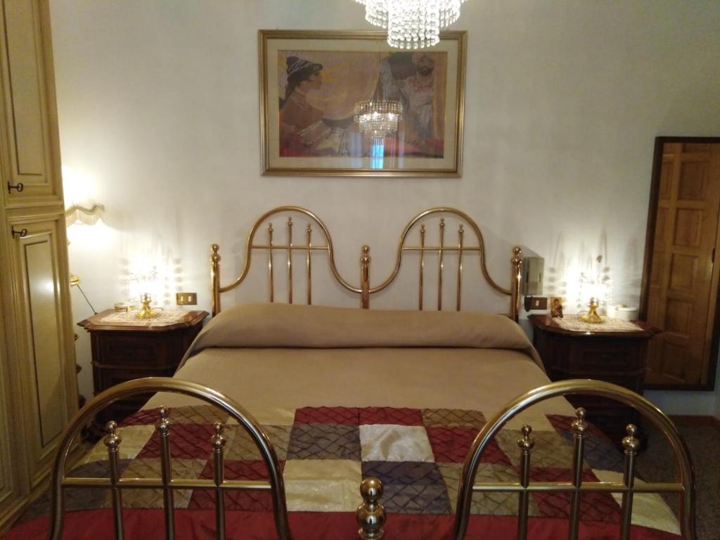 Posteľ alebo postele v izbe v ubytovaní Villa Cavaliere