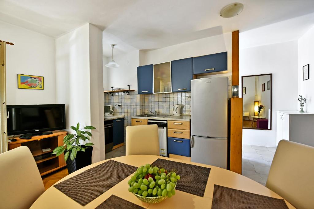 Kuchyň nebo kuchyňský kout v ubytování Apartment Nikola