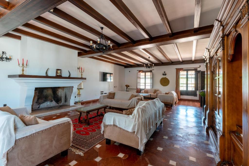 A bed or beds in a room at La Rejaquera
