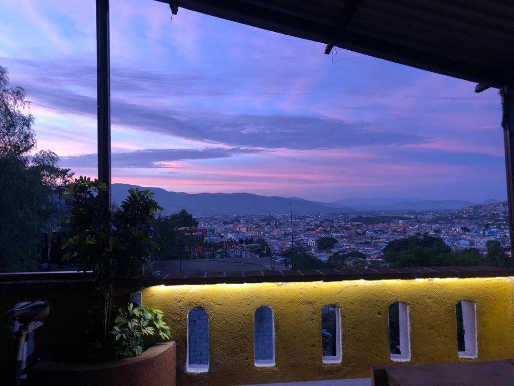 a view of a city at night at Terraza Cielito Lindo in Oaxaca City