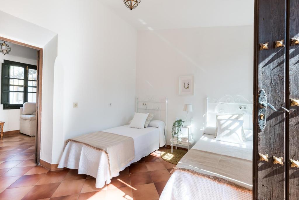 A bed or beds in a room at La Rejaquera