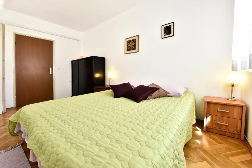 Postel nebo postele na pokoji v ubytování Apartment Nikola