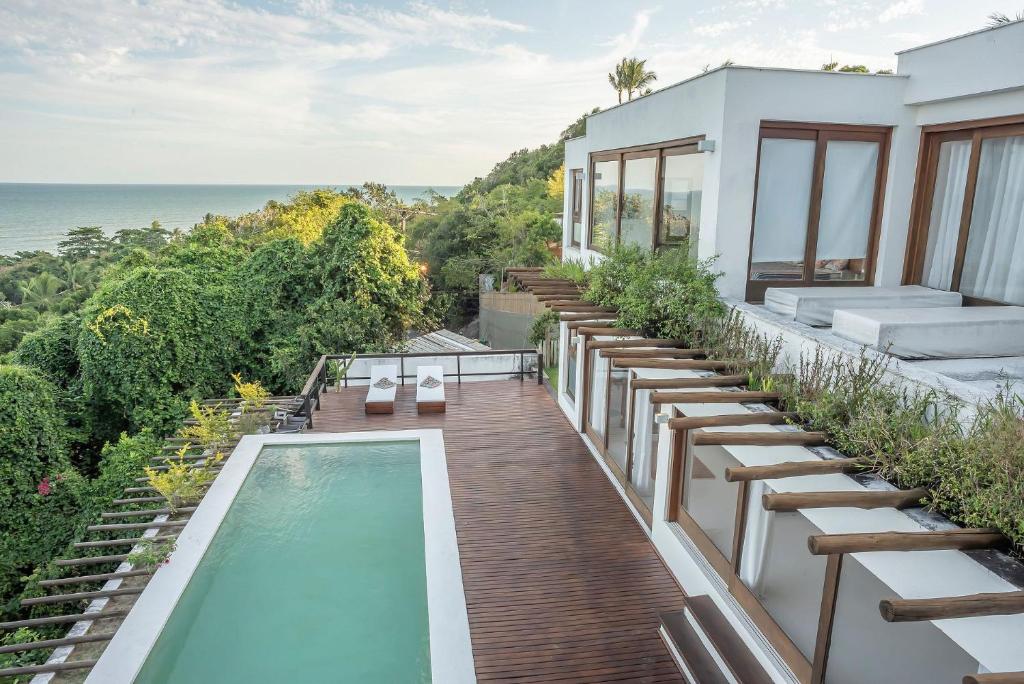 Casa Blanca - Alto padrão com suítes e piscina vista mar