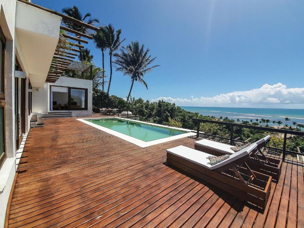 Casa Blanca - Alto padrão com suítes e piscina vista mar