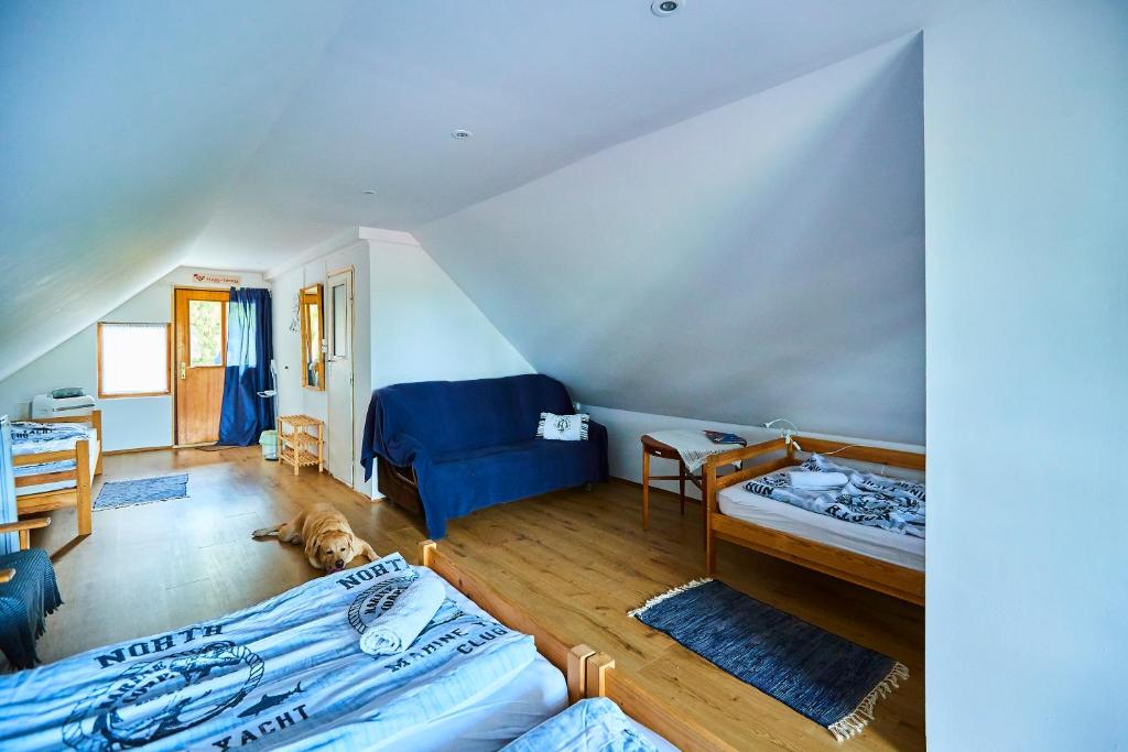 Postel nebo postele na pokoji v ubytování Kilátás a tóra Apartman