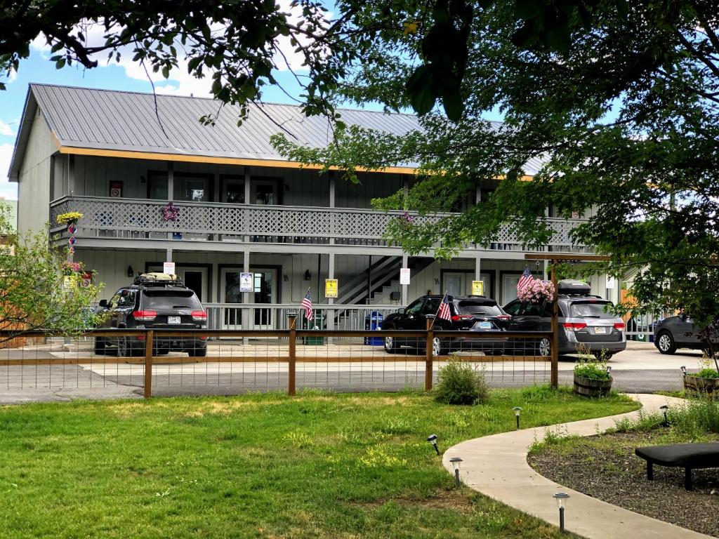 a building with cars parked in front of it at Healing Waters Resort and Spa in Pagosa Springs