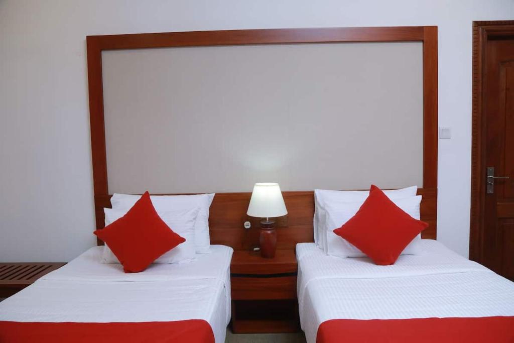 Postel nebo postele na pokoji v ubytování Tarshish Villa - Colombo