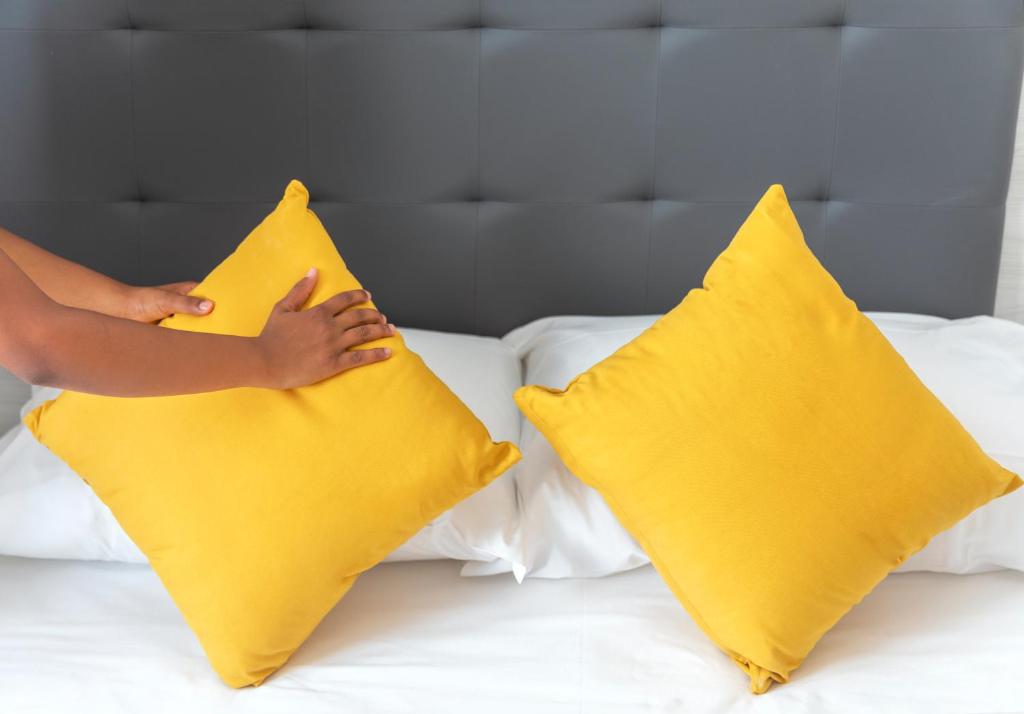 Posteľ alebo postele v izbe v ubytovaní Royal Sunset Hotel