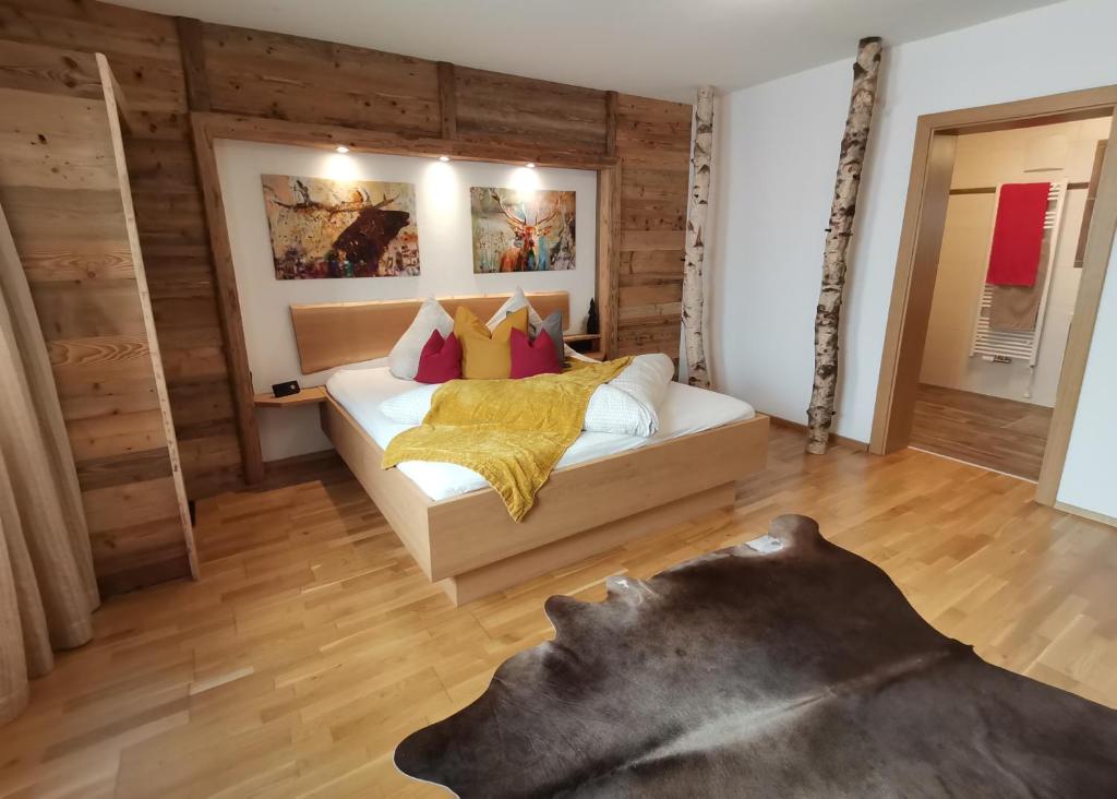 Postel nebo postele na pokoji v ubytování BERGHEIL Apartments