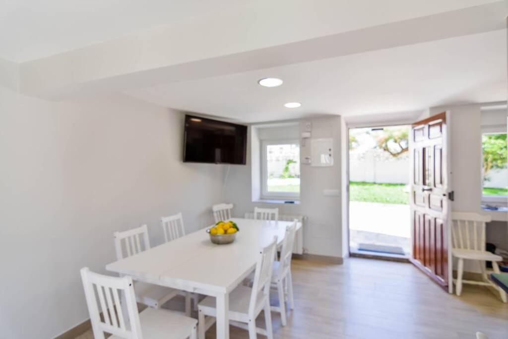 TV a/nebo společenská místnost v ubytování ¡Nuevo! Casa reformada, cómoda y con vistas al mar