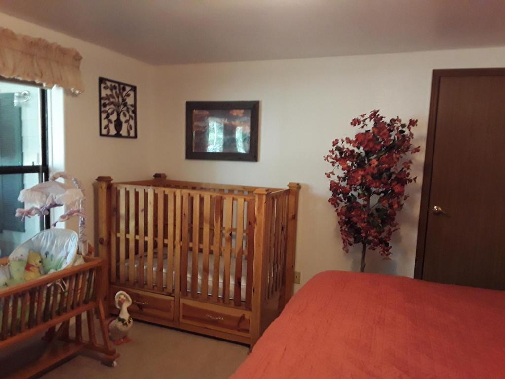 Postel nebo postele na pokoji v ubytování Serenity House Rental