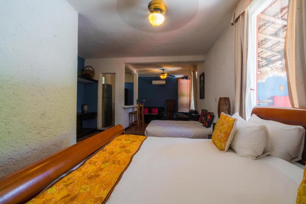 Postel nebo postele na pokoji v ubytování Casa de los Sueños Hotel Boutique