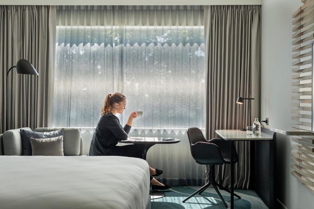 Postel nebo postele na pokoji v ubytování Novotel Tainui Hamilton