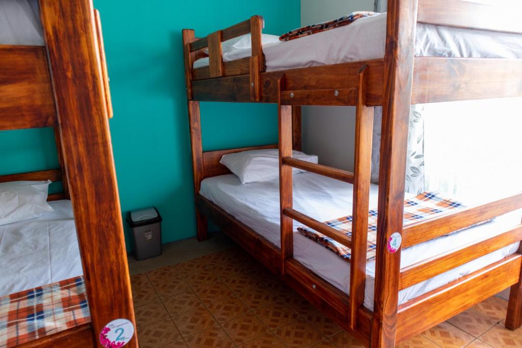 Postel nebo postele na pokoji v ubytování Hostel Bouganvilia Bed and Breakfast