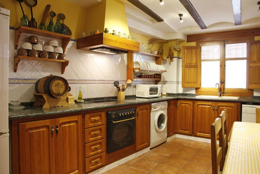 Kuchyň nebo kuchyňský kout v ubytování Casa Rural Rosa