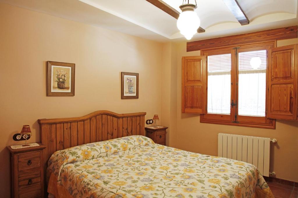 Postel nebo postele na pokoji v ubytování Casa Rural Rosa