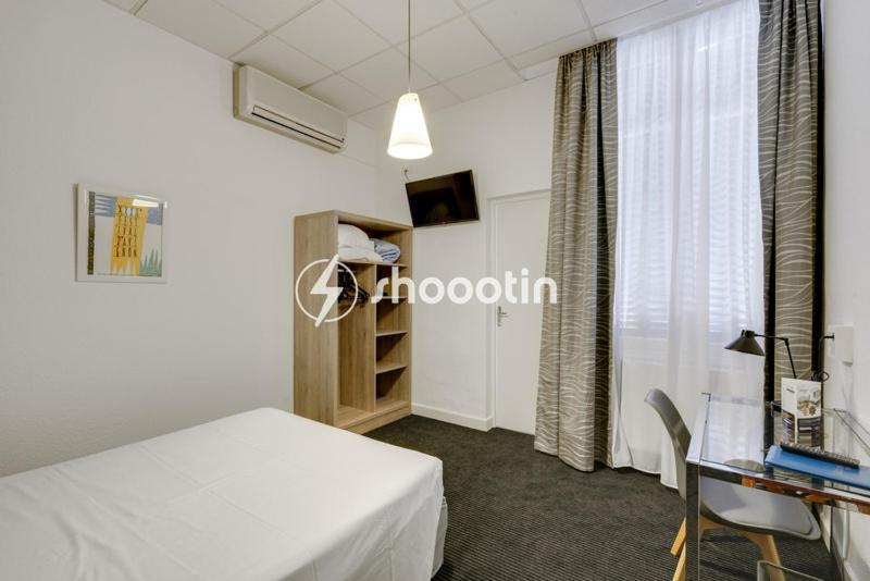 Postel nebo postele na pokoji v ubytování Hotel d'Angleterre