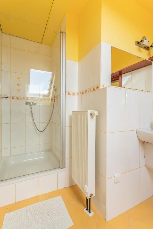 Vannas istaba naktsmītnē VS apartmán