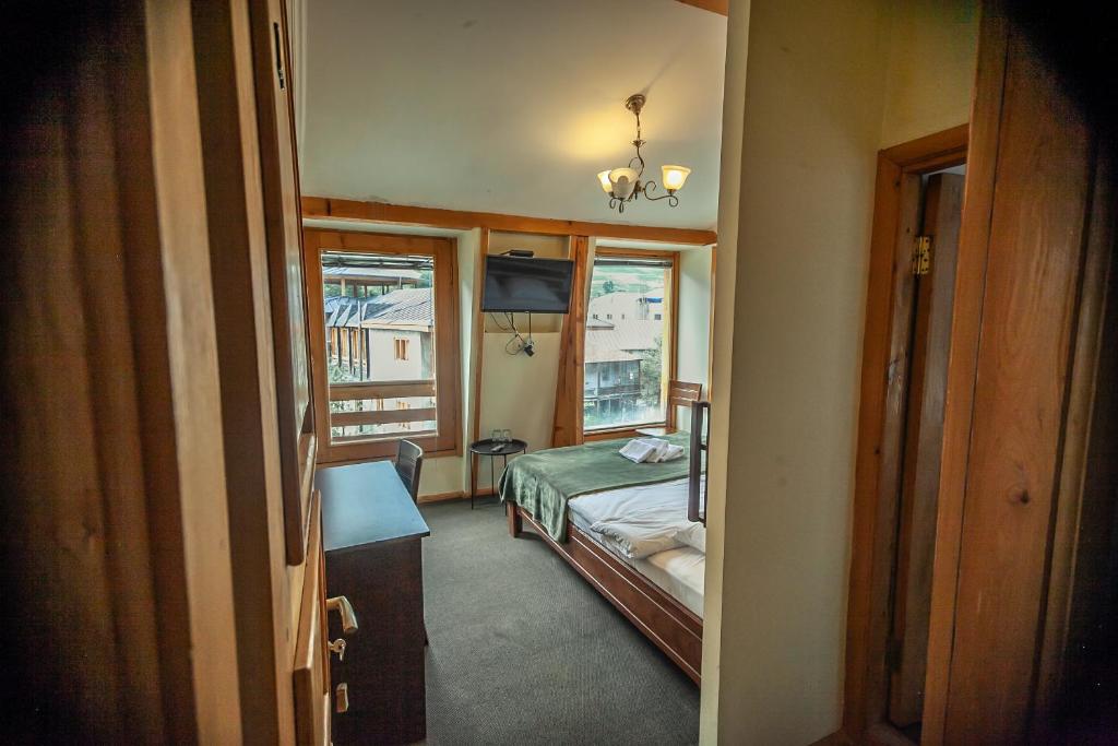 Postel nebo postele na pokoji v ubytování Hotel Old Seti