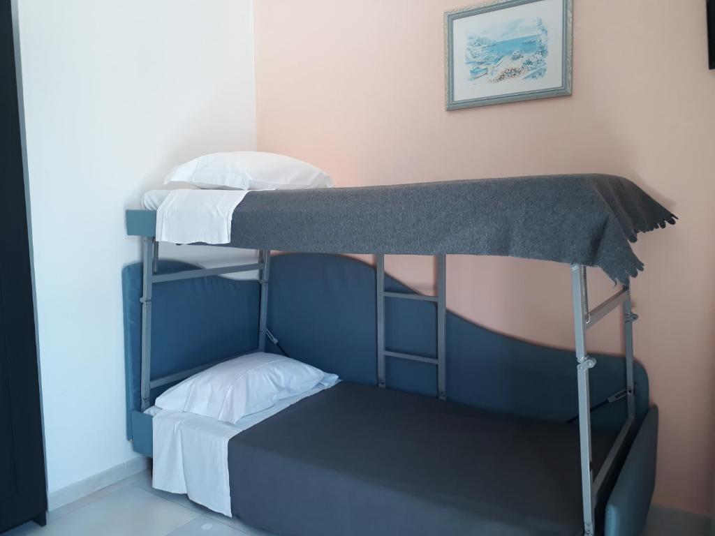 Letto o letti in una camera di Torre del Lago