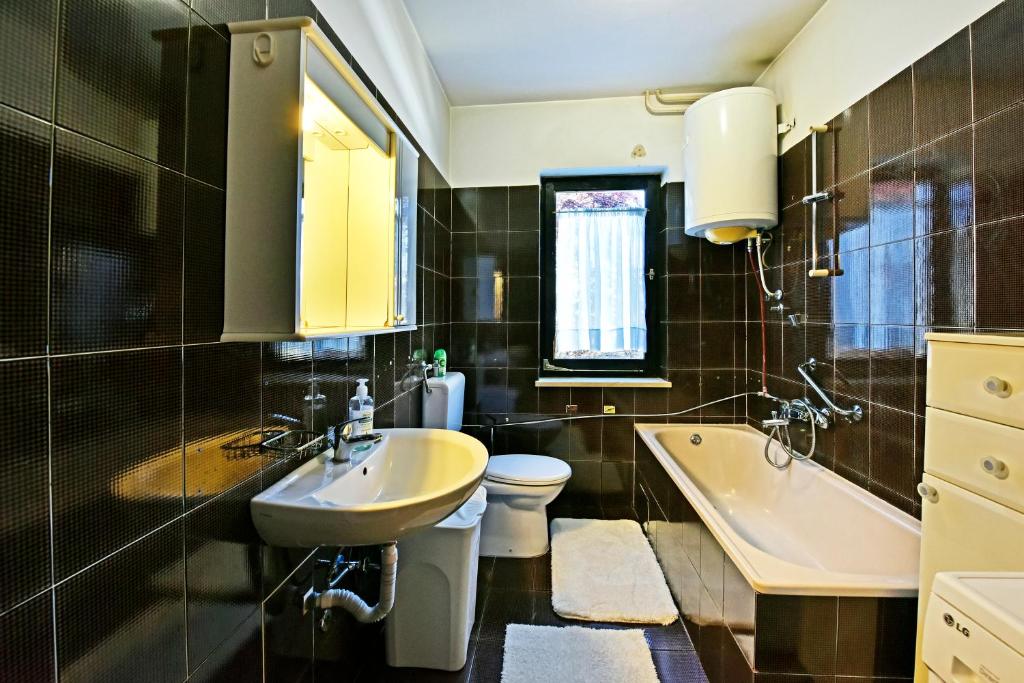 Koupelna v ubytování Apartment Nikola