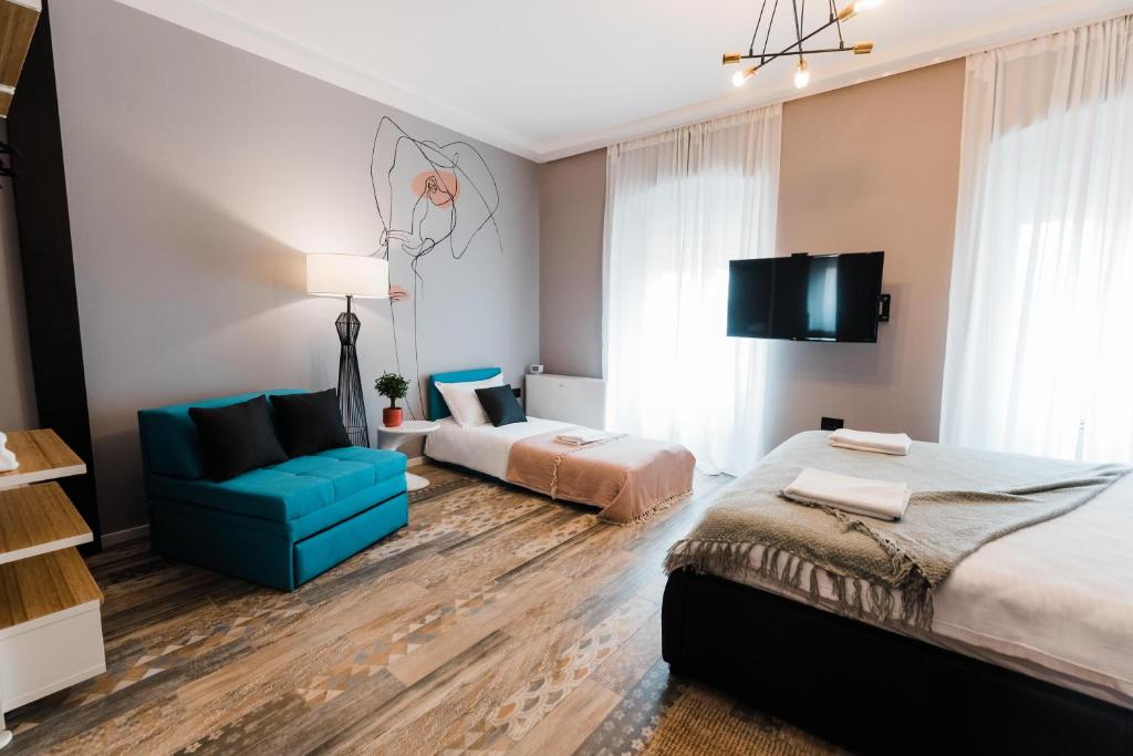 Postel nebo postele na pokoji v ubytování Square 19-Boutique rooms