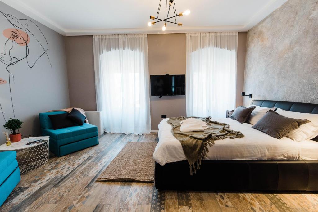 TV a/nebo společenská místnost v ubytování Square 19-Boutique rooms
