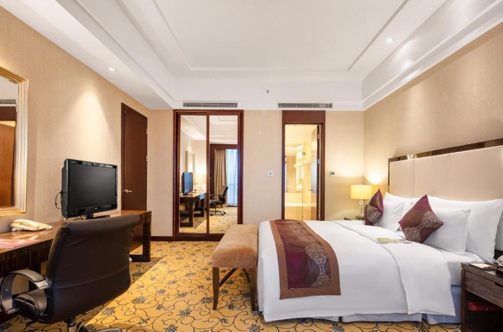TV a/nebo společenská místnost v ubytování Shenzhen L.gem Hotel