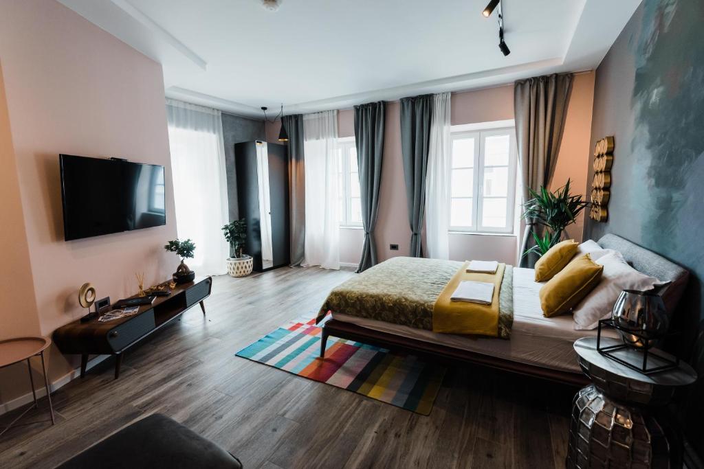 TV a/nebo společenská místnost v ubytování Square 19-Boutique rooms