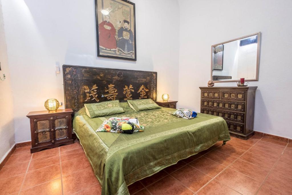 Postel nebo postele na pokoji v ubytování Casa Sabina - Villa Perenquén