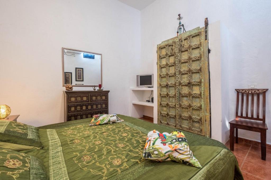 Postel nebo postele na pokoji v ubytování Casa Sabina - Villa Perenquén