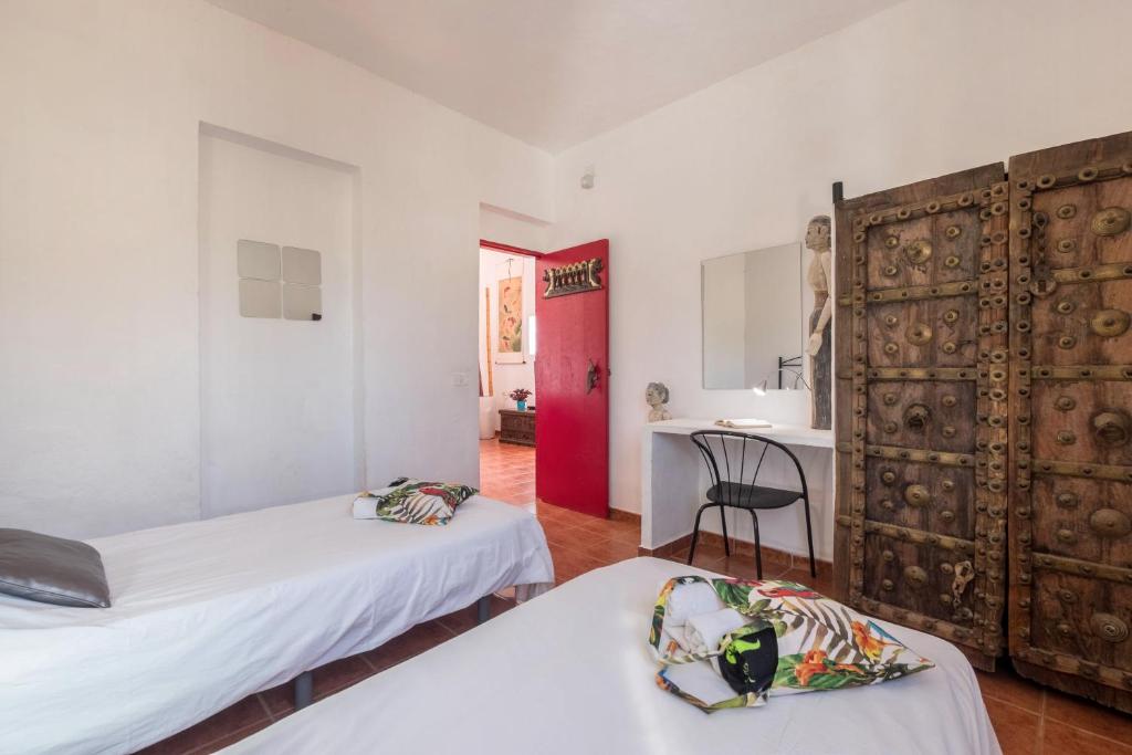 Postel nebo postele na pokoji v ubytování Casa Sabina - Villa Perenquén