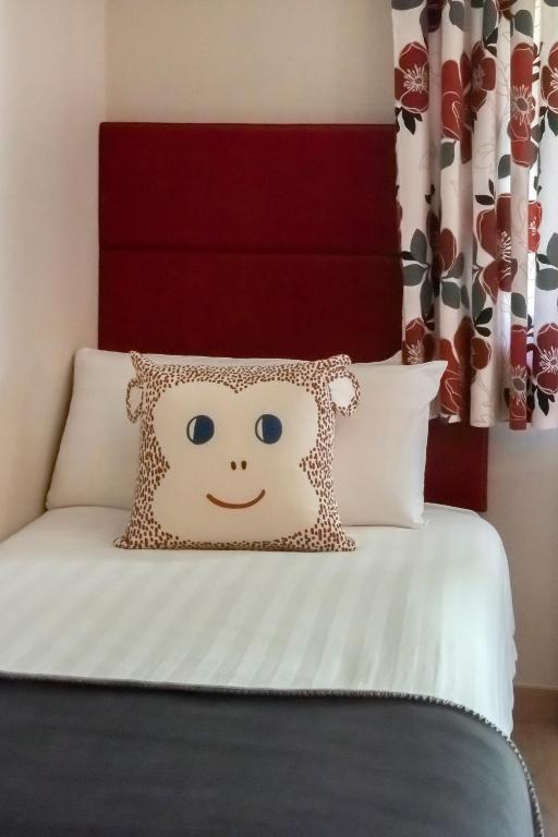 Postel nebo postele na pokoji v ubytování Hotel Palarine