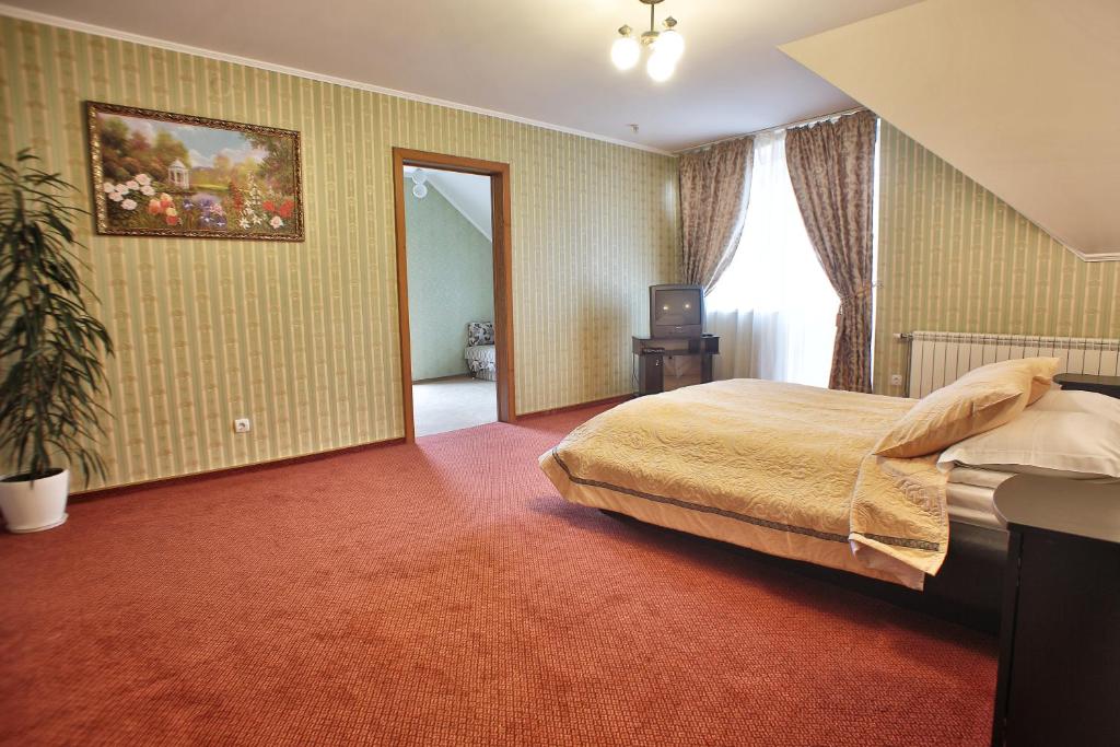 Postel nebo postele na pokoji v ubytování U Anity